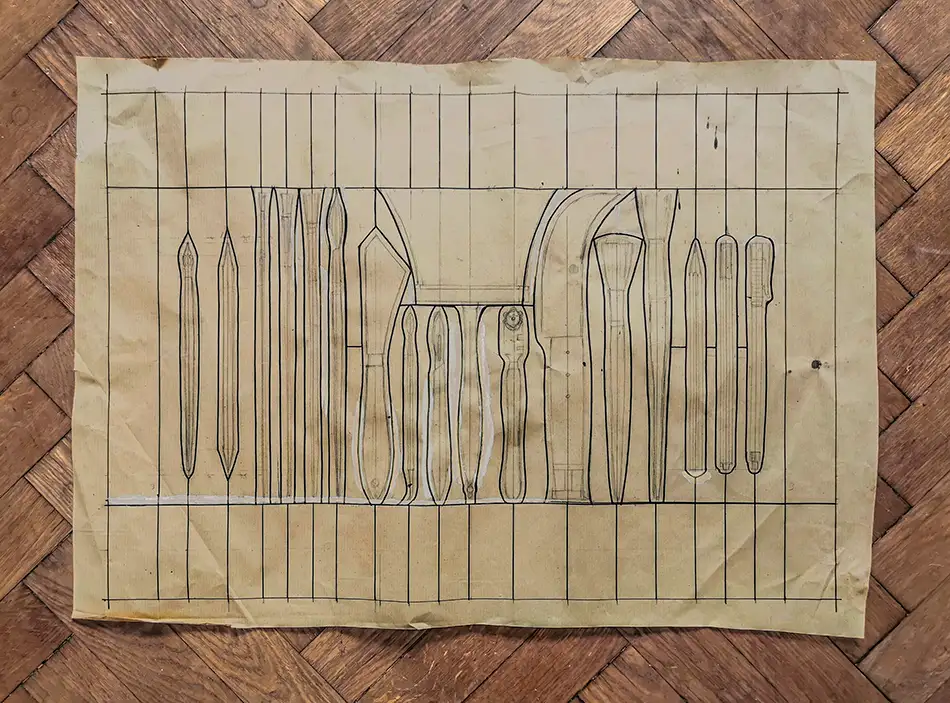 Draft for stained glass window at Tiroler Glasmalerei with depictions of tools used in glass painting
</div>
</div>
<footer>
<div class=