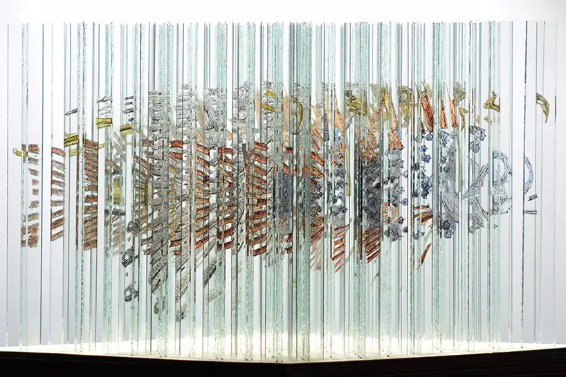 Mixture of glass cube image fragments with four anamorphic paintings