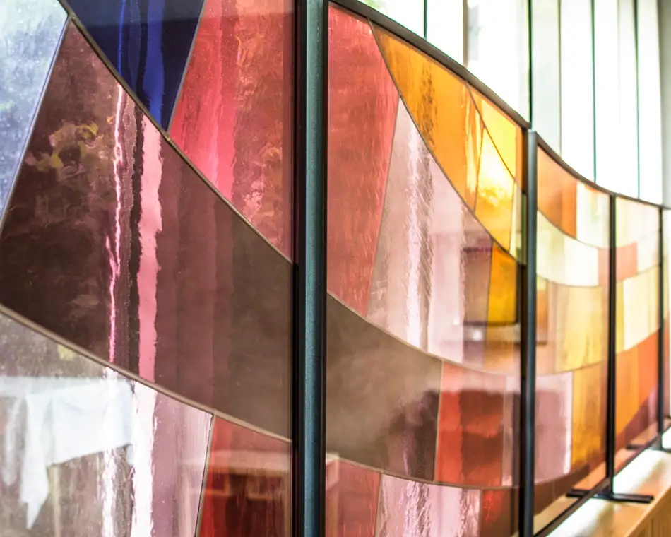Colourful stained glass as a privacy screen for a care home