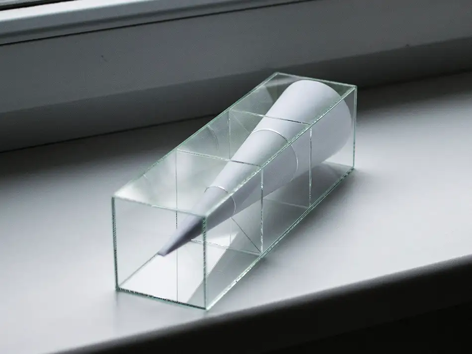 anamorphic installation made of glass and a pencil drawing in which an eye is visible in a cone - backside of the installation