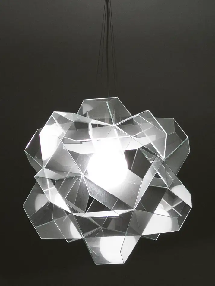 Geometric lampshade made of fabless glass at night
