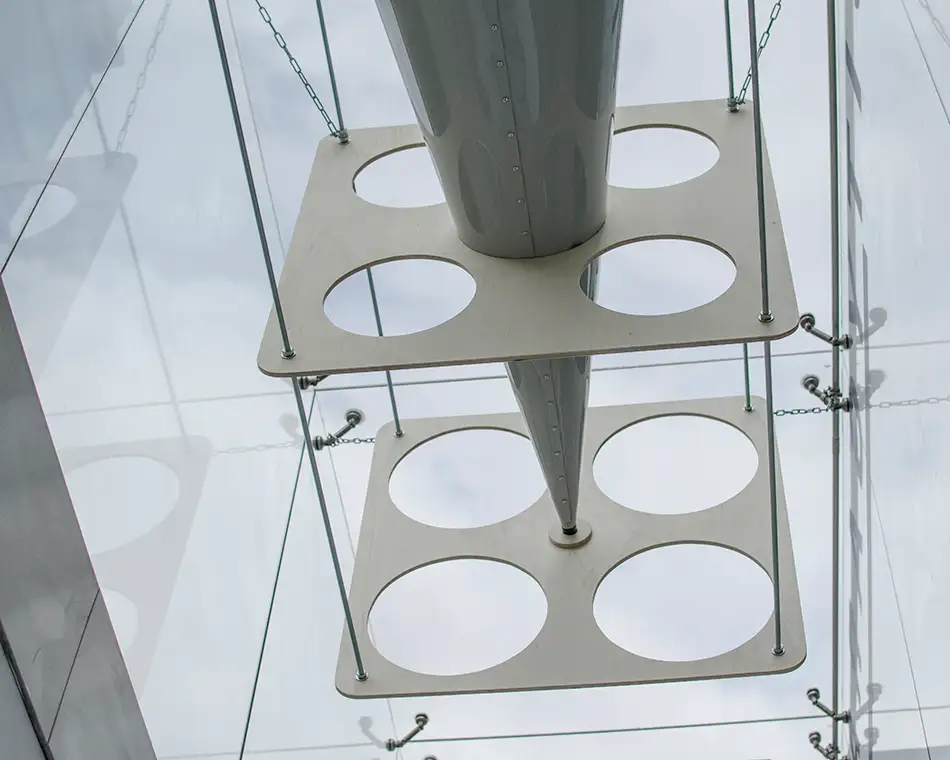 Anamorphic installation in public space in which an eye is visible in a cone - Detail from below