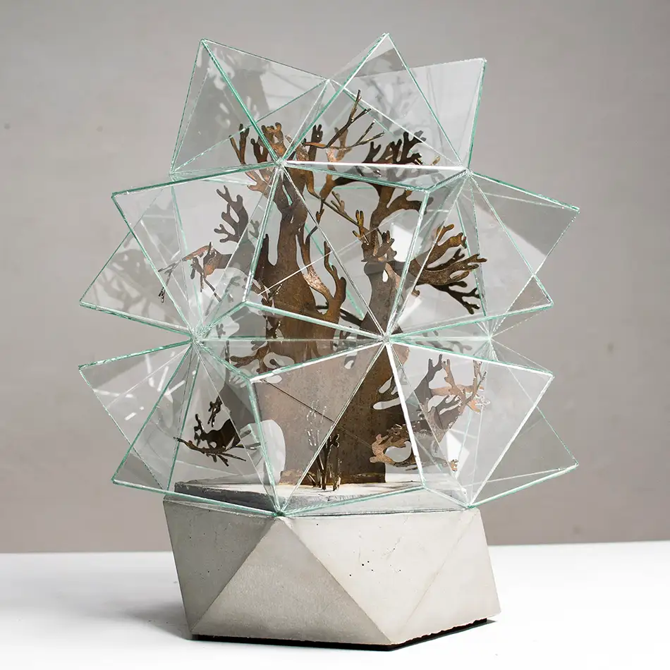 Artwork reminiscent of a greenhouse, consisting of a geometric glass enclosure, a concrete plinth and a plant-like steel structure