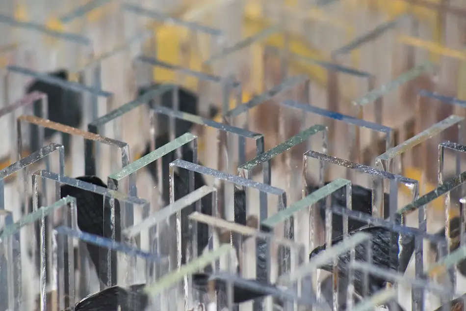 Anamorphic glass art with four fragmented images - glass strips
