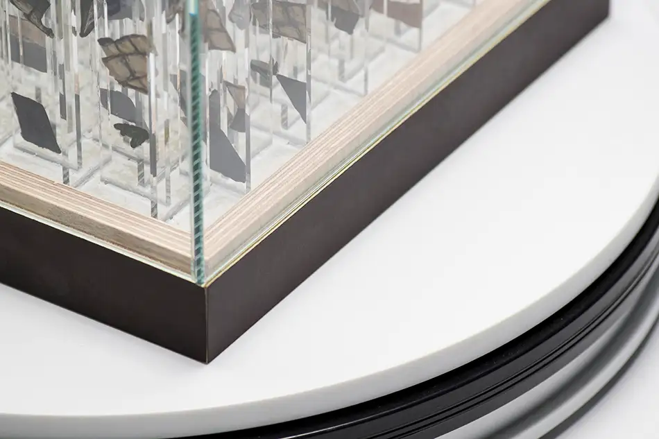 Anamorphic glass art with four fragmented images - detail of the base