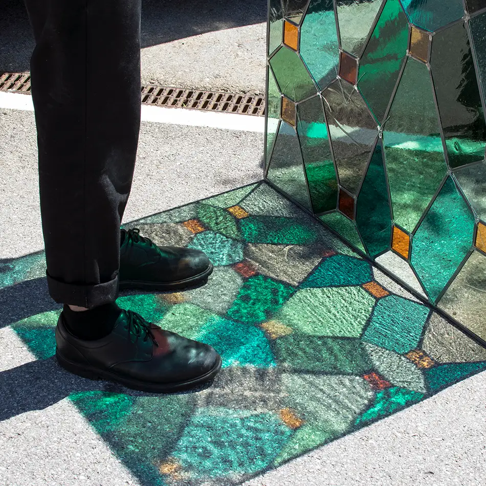 stained glass windows - glass art - Fellner-Haus - sunlight on the street